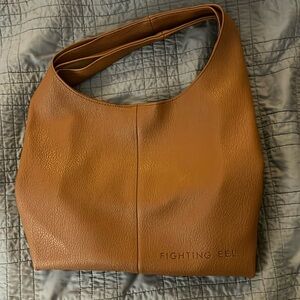 EUC excellent used condition Fighting Eel slouchy leather hobo tote in tan.